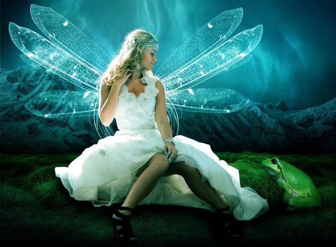 A whimsical scene featuring a woman dressed as a faery, wearing a flowing white dress and delicate wings.